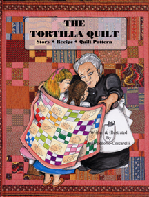 The book jacket shows  a grandma wrapping a quilt around two girls. 