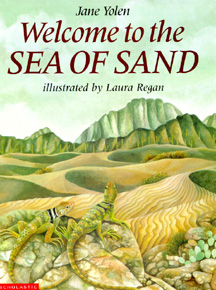 The book jacket shows lizards looking out on a sea of sand.