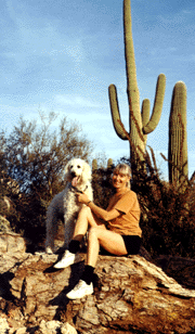 Photograph of Judi Moreillon and her dog Tessa taken in the Catalina Mountains