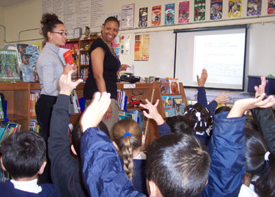 This is a photograph of Melanie and Keisa team teaching.